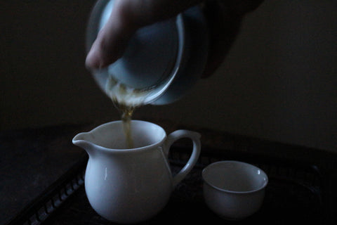 Pouring the first steep into the Cha Bei, or 'fairness pitcher'