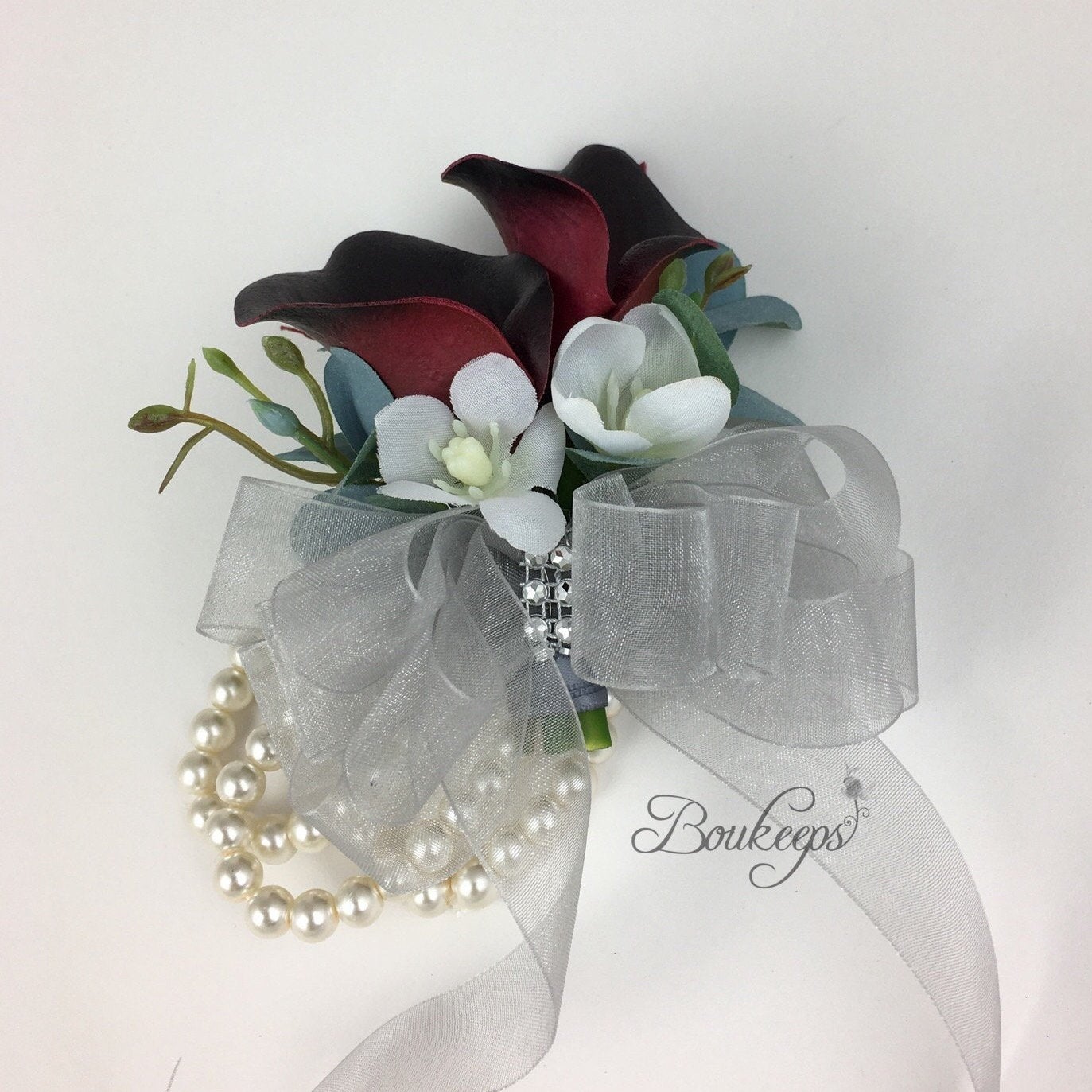 burgundy calla lily corsage