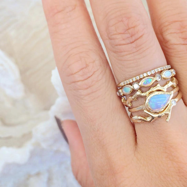 Stacked handcrafted gold rings 