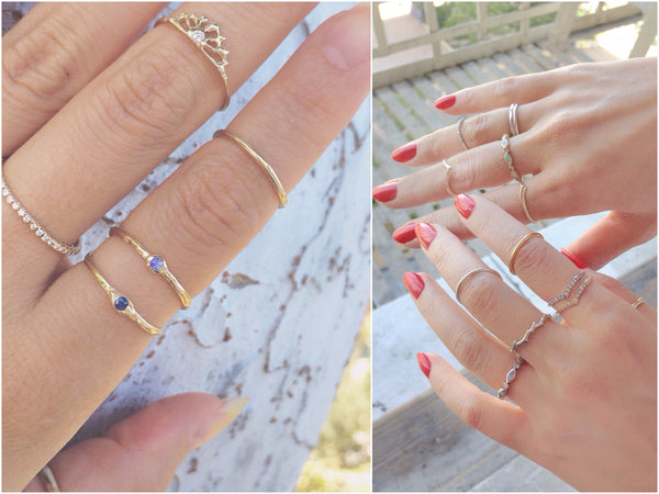 yellow gold handcrafted rings on model's hands