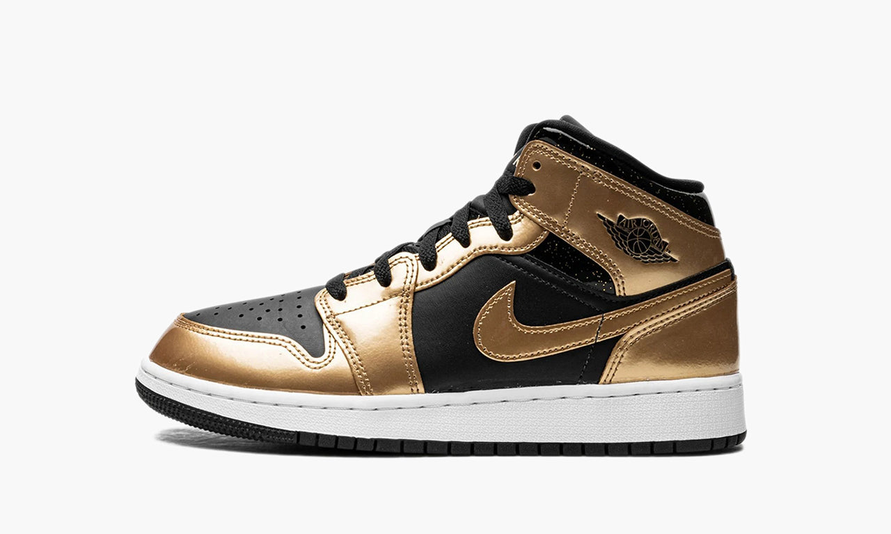 gold and black jordan 1's