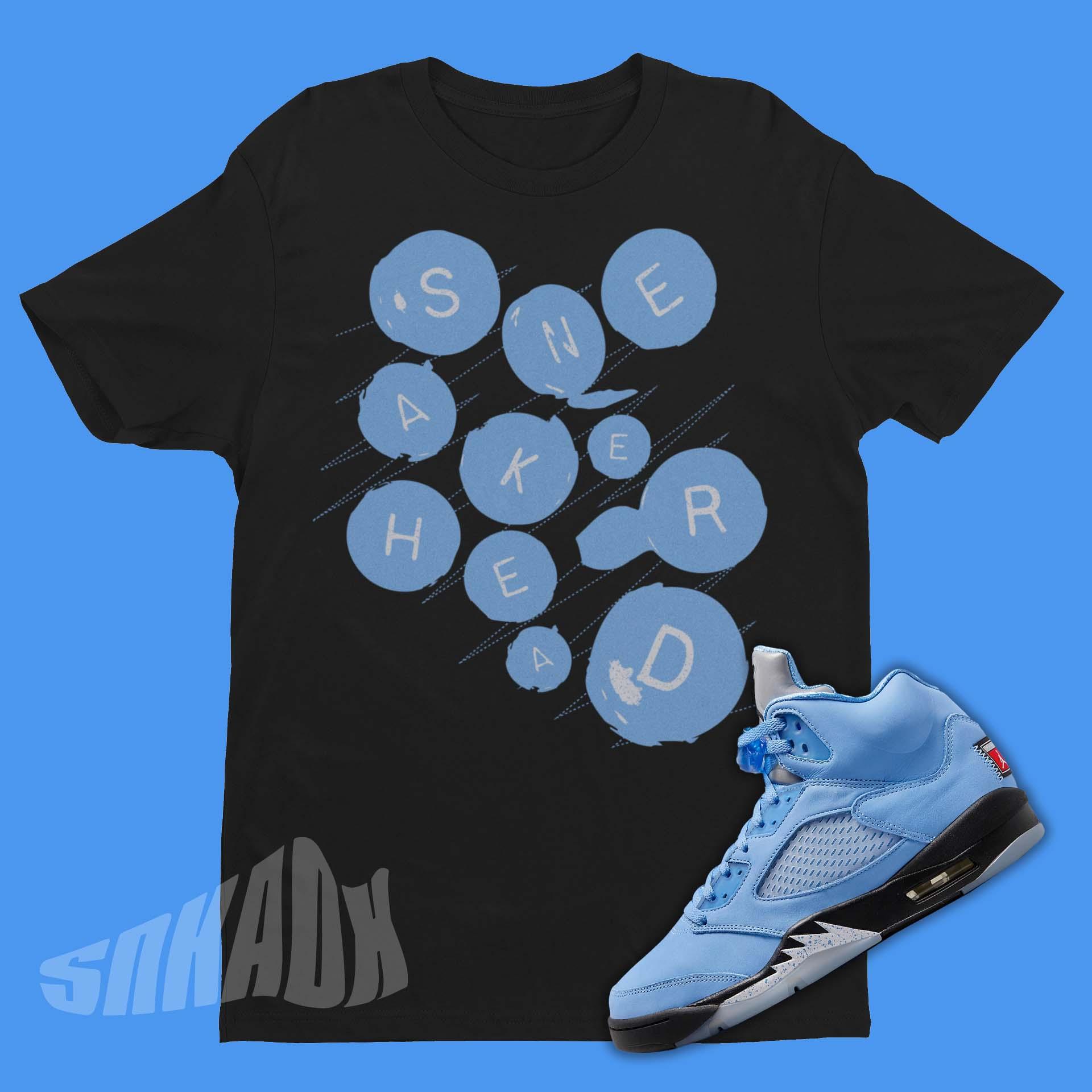 blue and grey jordan shirt