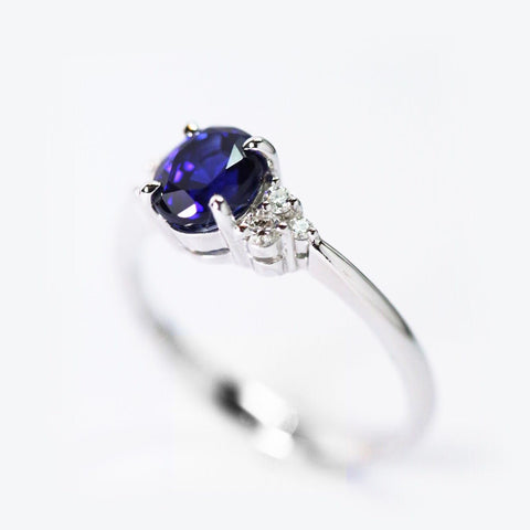 1.59ct royal blue sapphire in our modified Eternal love collection embrace design