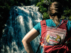 Old Trapper Old Fashioned Beef Jerky in a hiking backpack