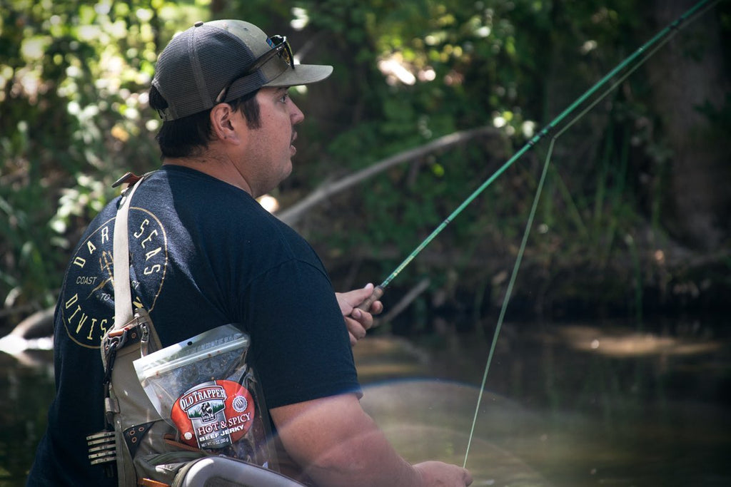 Hot and Spicy Beef Jerky bag being carried while fishing.