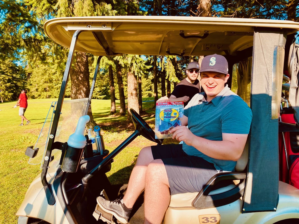 Teriyaki Beef Jerky being eaten while on the golf course.