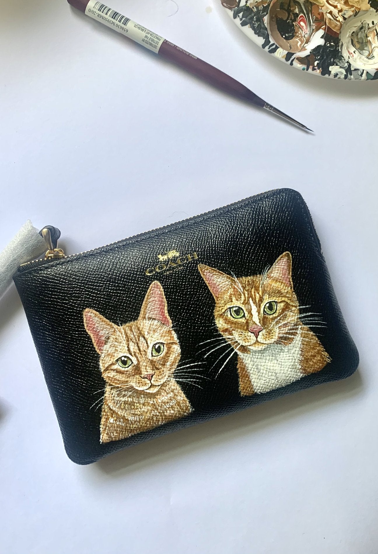 coach cat wristlet