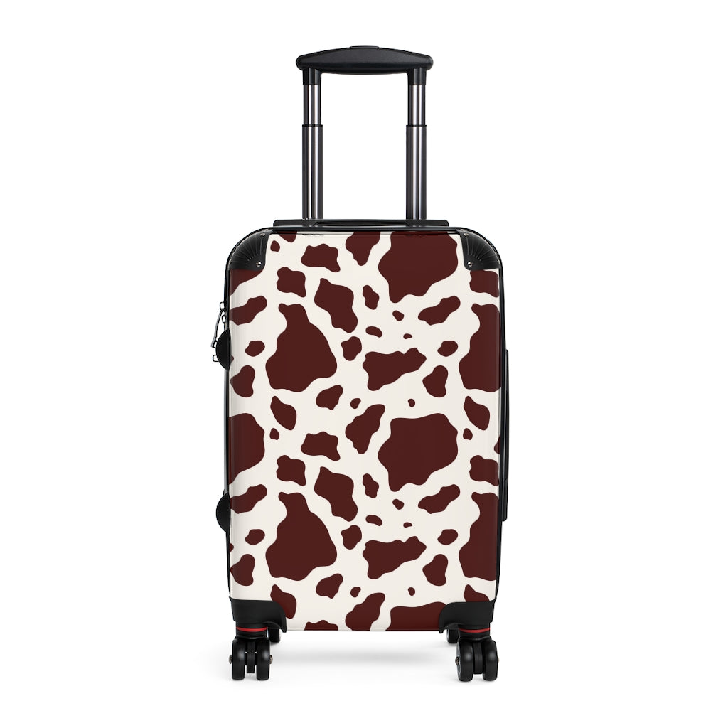 cow print luggage