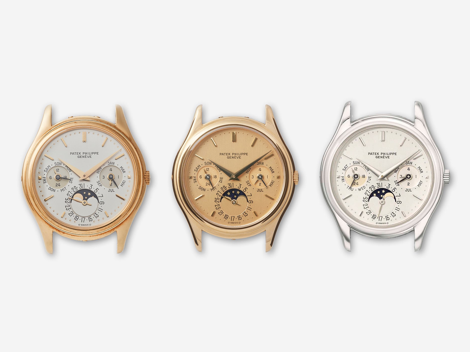 Three Patek Philippe 3940 first series with yellow gold and white gold cases with champagne and opaline dials