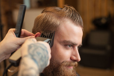 Bearded Guy getting a haircut