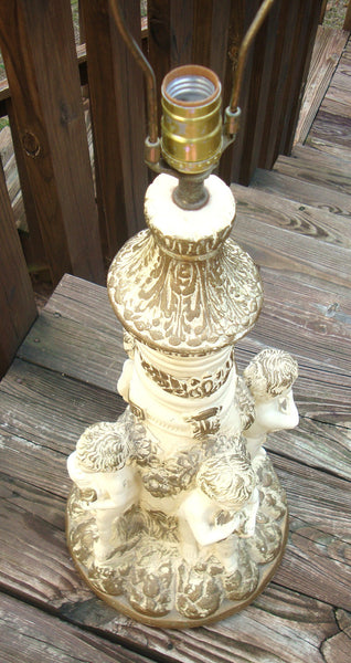 gold cherub lamp