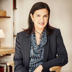 Maggie Henriquez at her office desk