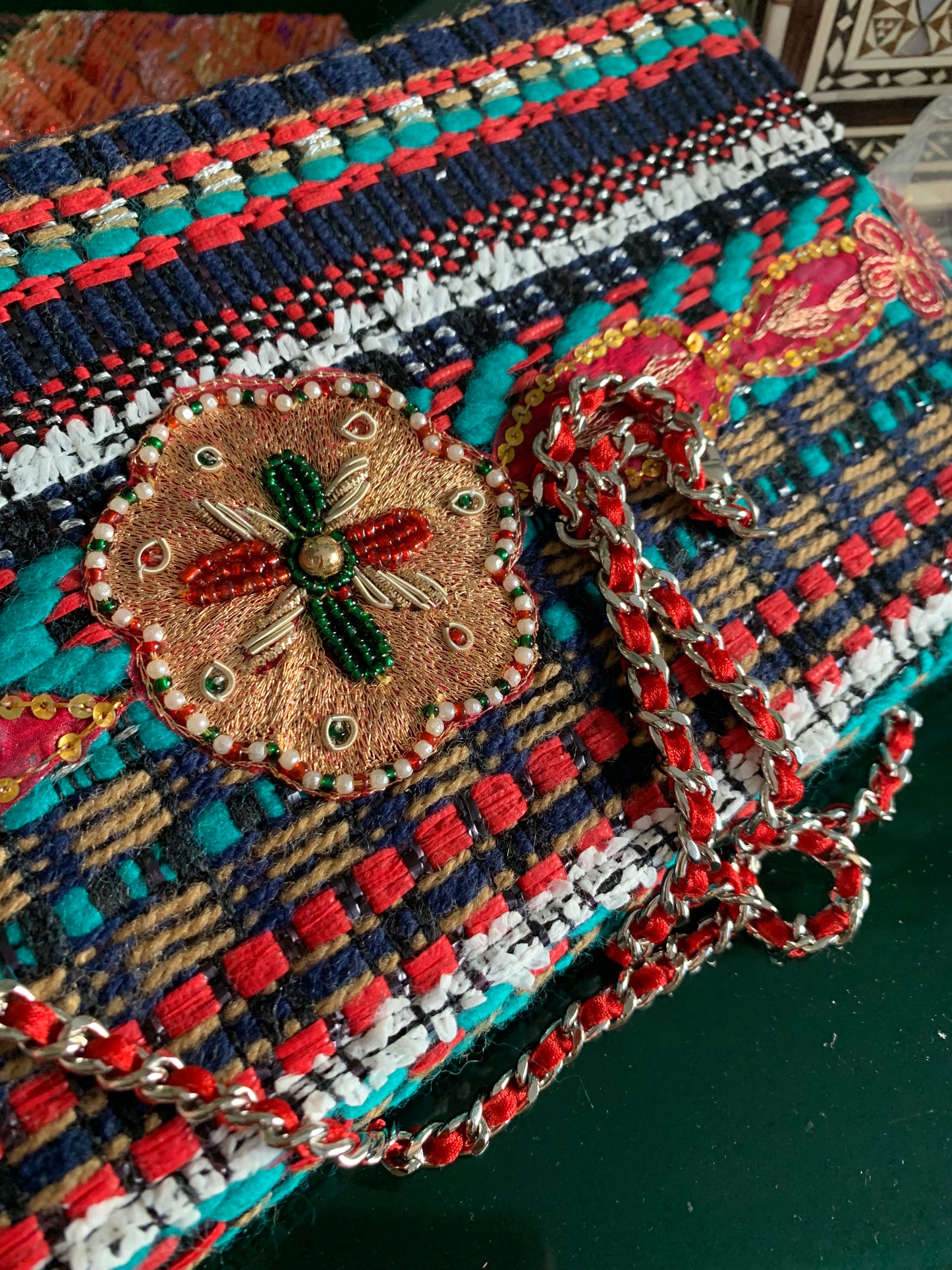 Classic striped clutch with embroidery