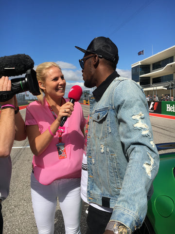 Rosanna Tennant interviews celebrities at the F1