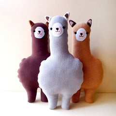 http://purelyalpaca.com/collections/alpaca-toys/products/alpaca-plush-cushion-little-odd-forest