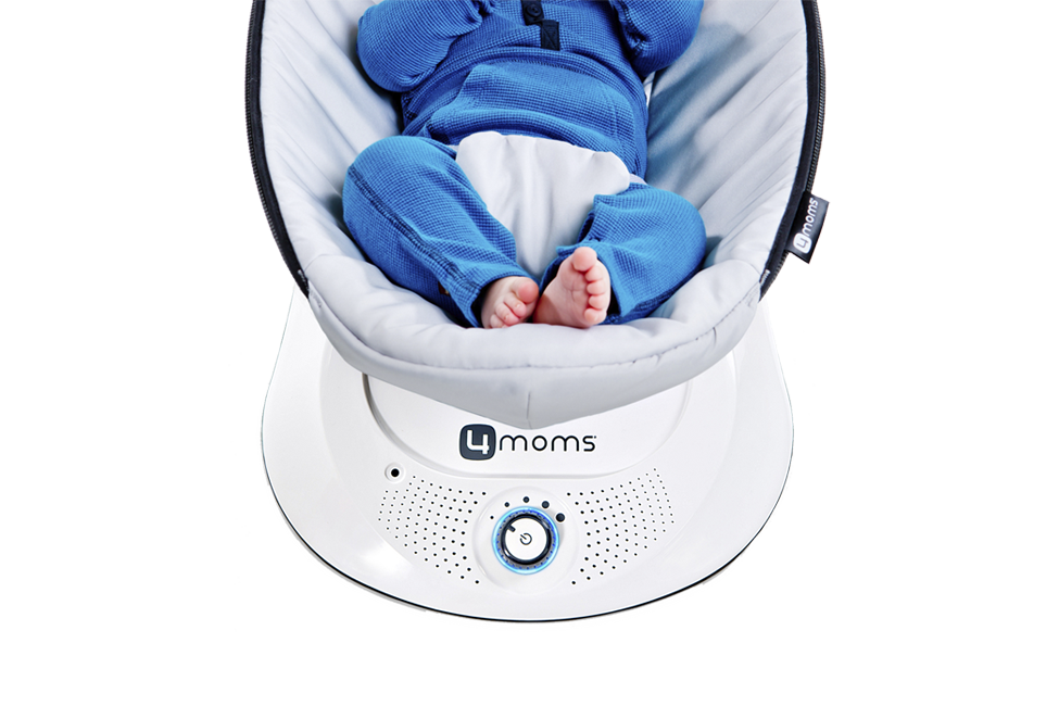 baby in swing with soothing adjustable speeds