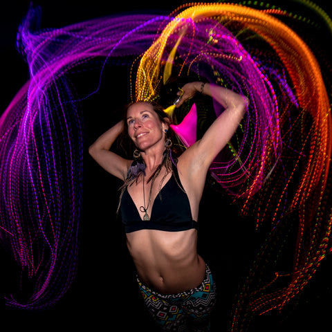 Dancer and hooper pixelwhipping with an LED whip