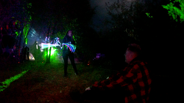 Jasmine giving a light show to an audience at the Crash Site stage