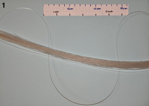 Fiberoptic whip fibers getting woven into a single bundle 