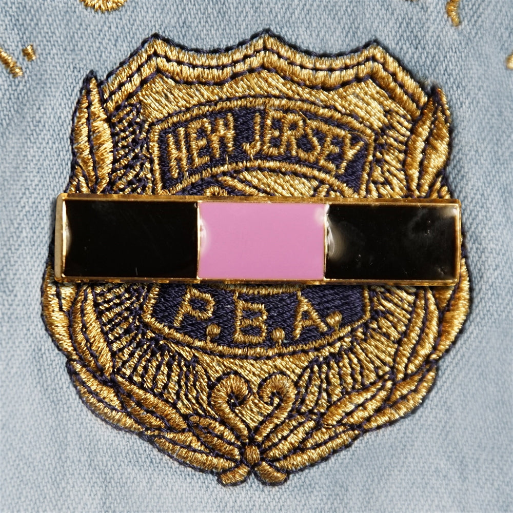 nypd police badge with black band