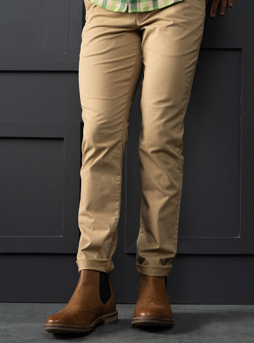 chinos with cowboy boots