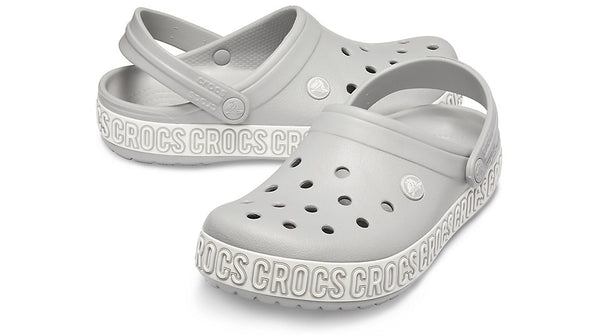 grey and white crocs