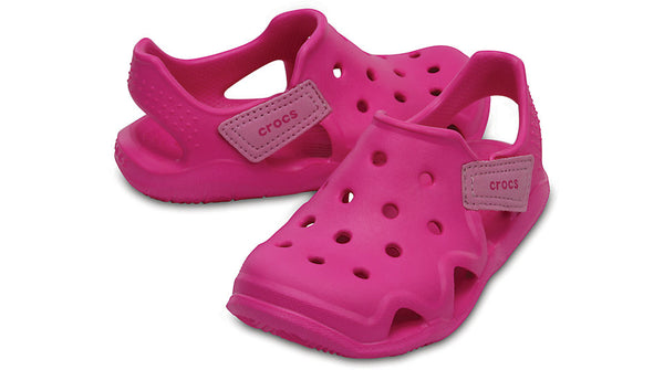 neon magenta crocs