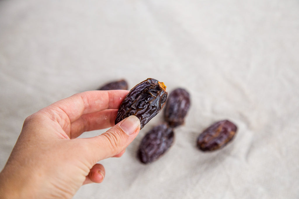 Why did Naked Paleo choose dates as an ingredient for their whole food bars blog post