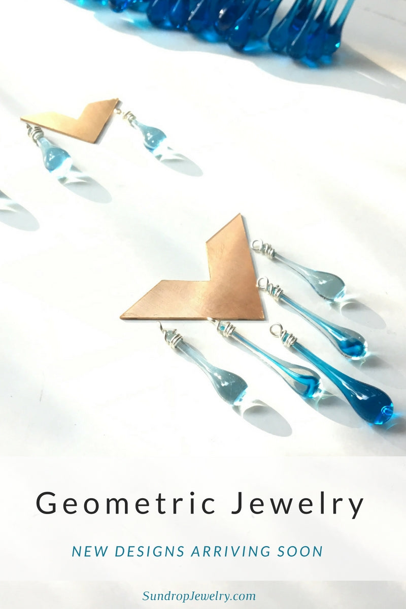 Geometric statement jewelry in bronze by Sundrop Jewelry