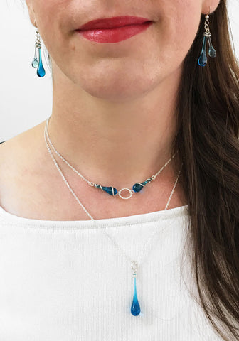 Layering a choker and pendant necklace