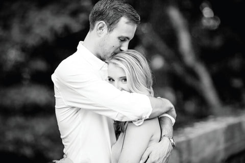 black and white engagement phot of a couple