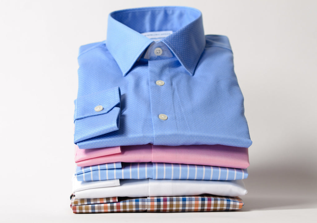 Stack of Newbury Mills dress shirts