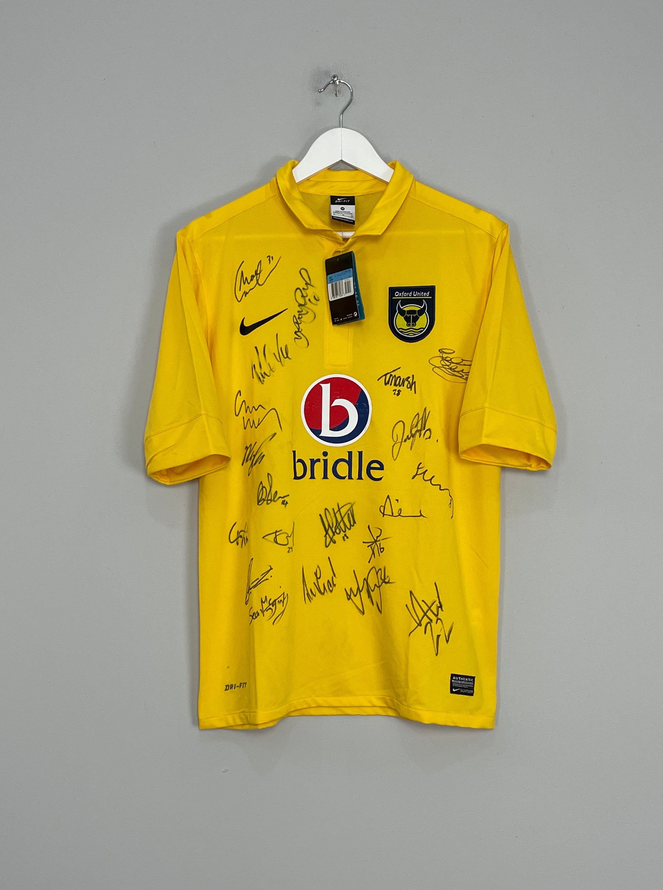 2012/13 OXFORD UNITED *SQUAD SIGNED* BNWT HOME SHIRT (M) NIKE