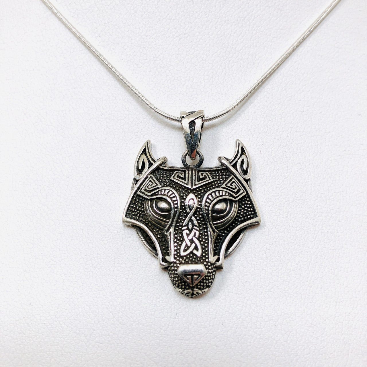 silver wolf medallion