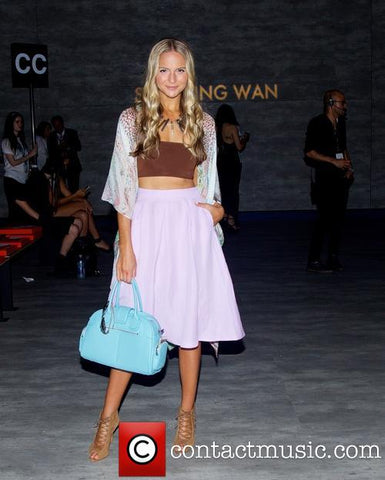 Jackie Miranne with baby blue Glass Handbag Classic satchel at New York Fashion Week