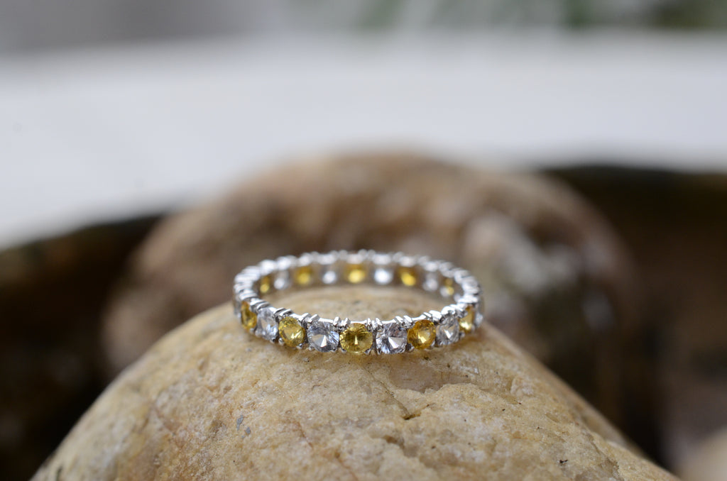 yellow sapphire and diamond eternity ring