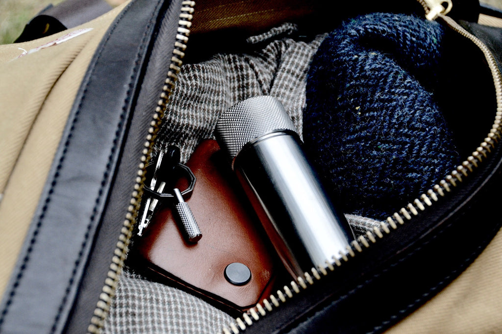 Wingback Hip Flask in bag