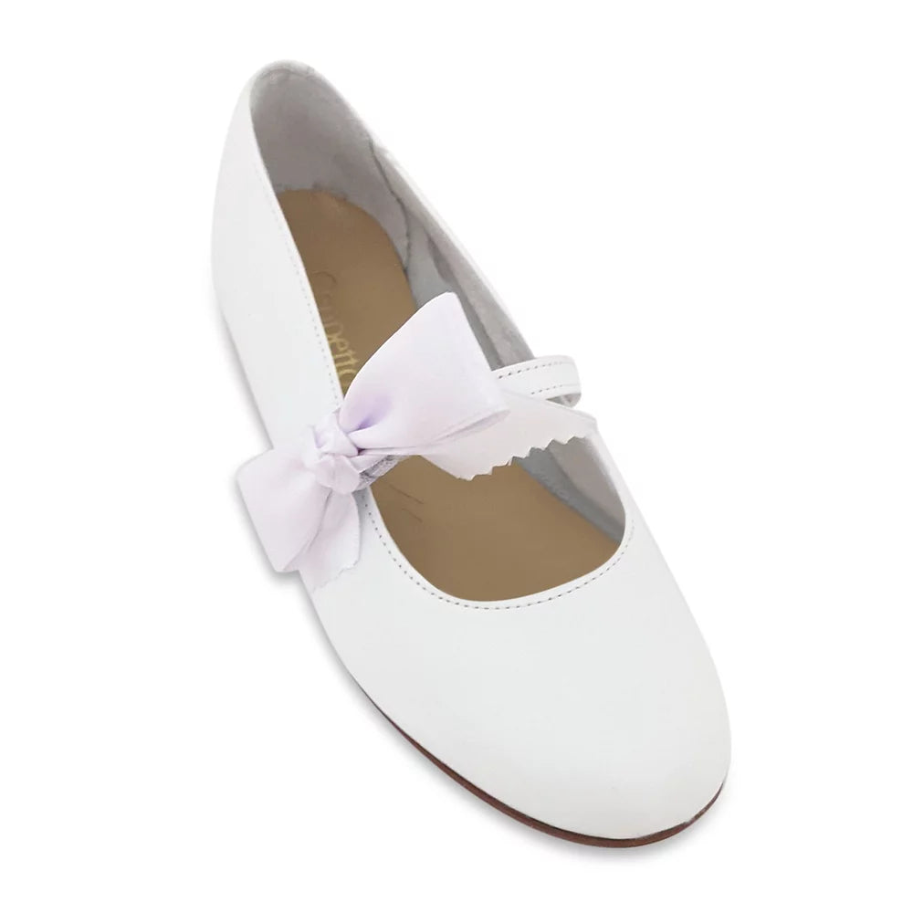 The feminine satin bow detail in this white shoe will perfectly complement any outfit. With the bow the shoe will be perfect for attending any party, holiday, or wedding. You can remove the bow and your child will be ready to walk to school. Its soft leather construction promotes natural movement and proper foot development. They have a rubber sole, and cushioned insole. Each Geppetto’s shoe is handcrafted by our expert shoemakers with only the finest luxury materials.