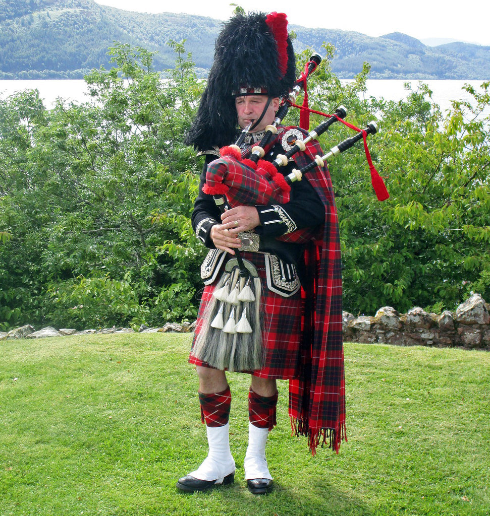 Scottish Highlander wearing a plaid