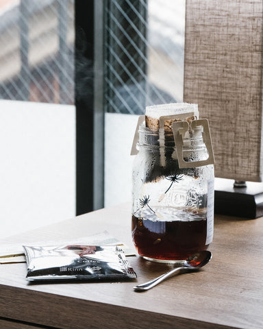 making drip coffee in a mason jar in a hotel room in Tokyo