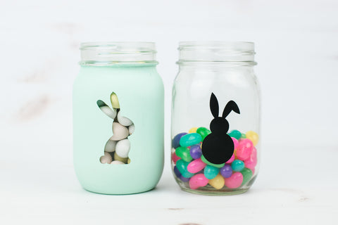 Easter bunny mason jars filled with Easter mini eggs and colorful jelly beans