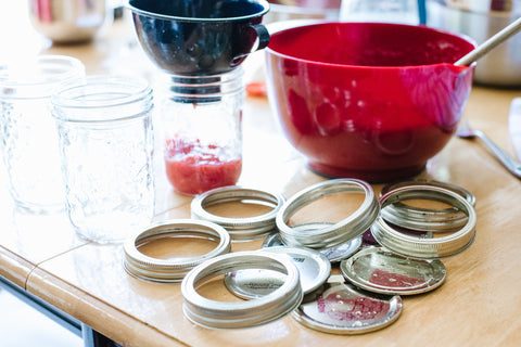 two piece canning lids can be reused over and over again for freezing food in mason jars