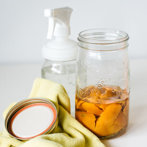Swap toxic chemical cleaners for DIY cleaners in reusable glass jars