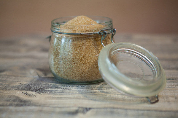 image of a clear jar full of erythritol, a natural sweetner