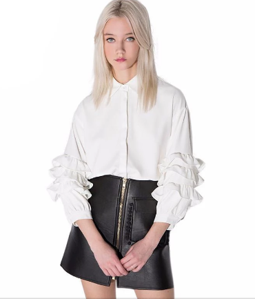 blonde woman modeling Lobby Andy White Ruffle Blouse