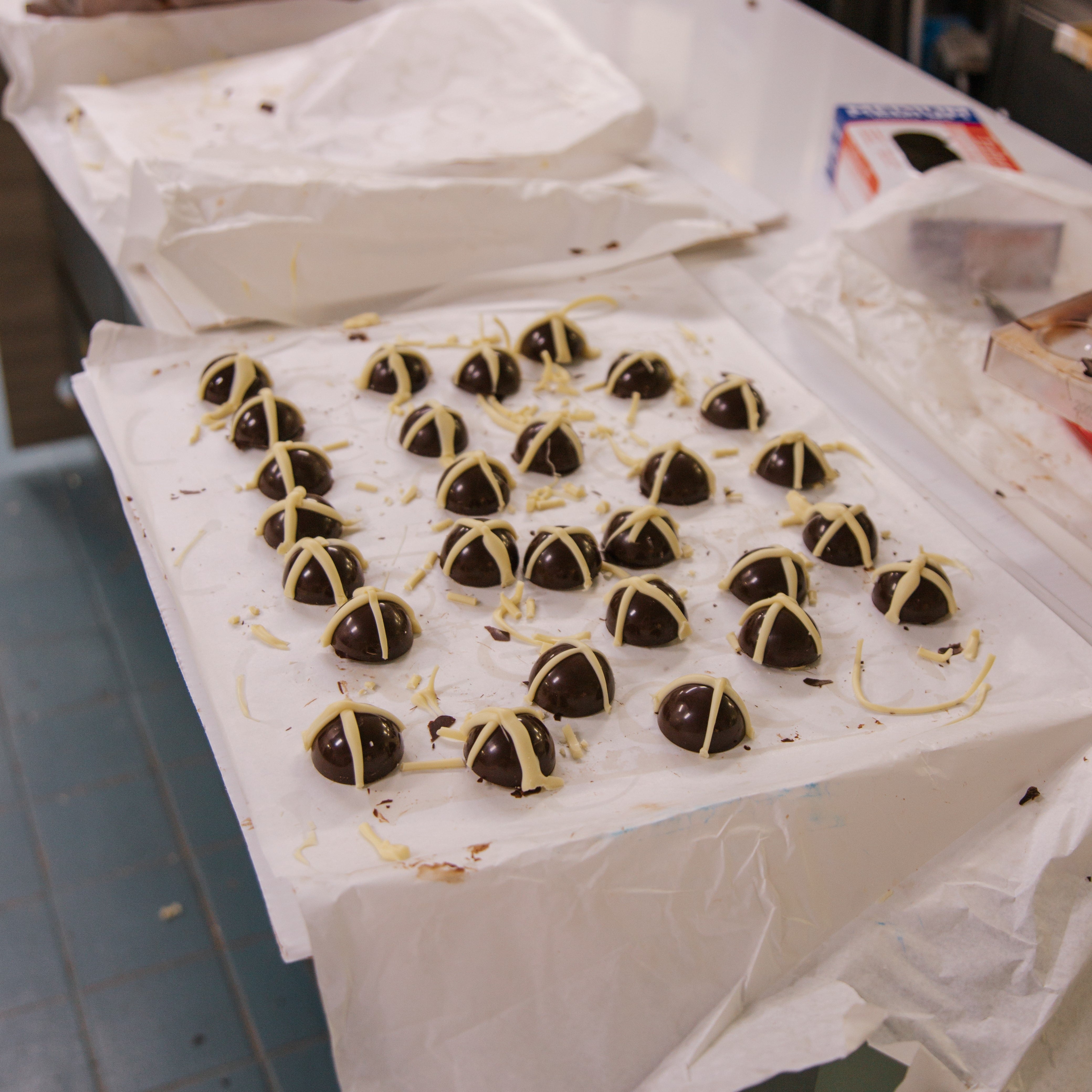 display of brumble bean chocolates sitting on a table