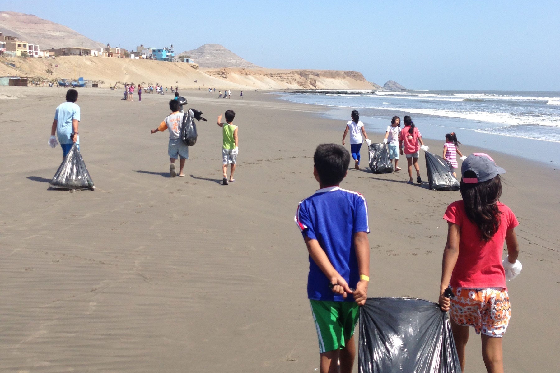 Surf the Greats Chicama Beach Clean Up Sustainable Travel