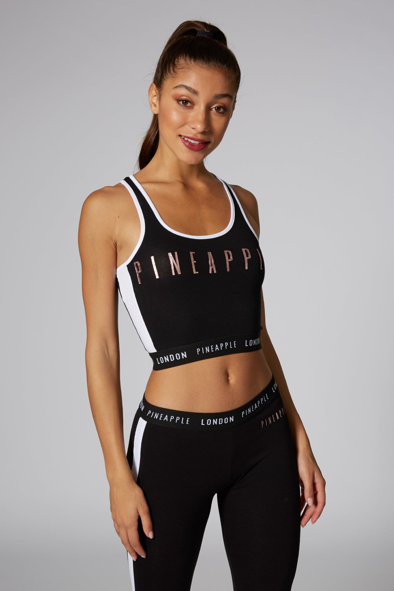 Woman wearing Pineapple Black Midi Crop Top