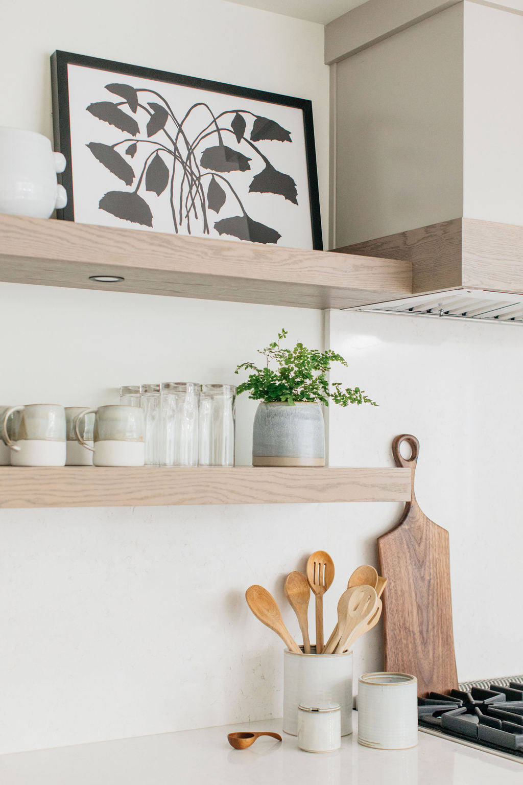 greige design shop + interiors alexandria project light grey cabinetry brass hardware open shelves