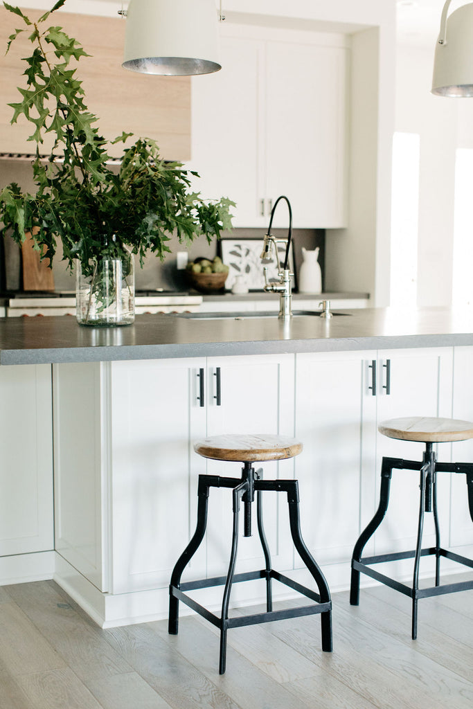 greige design shop + interiors albion project san diego california white kitchen black counters